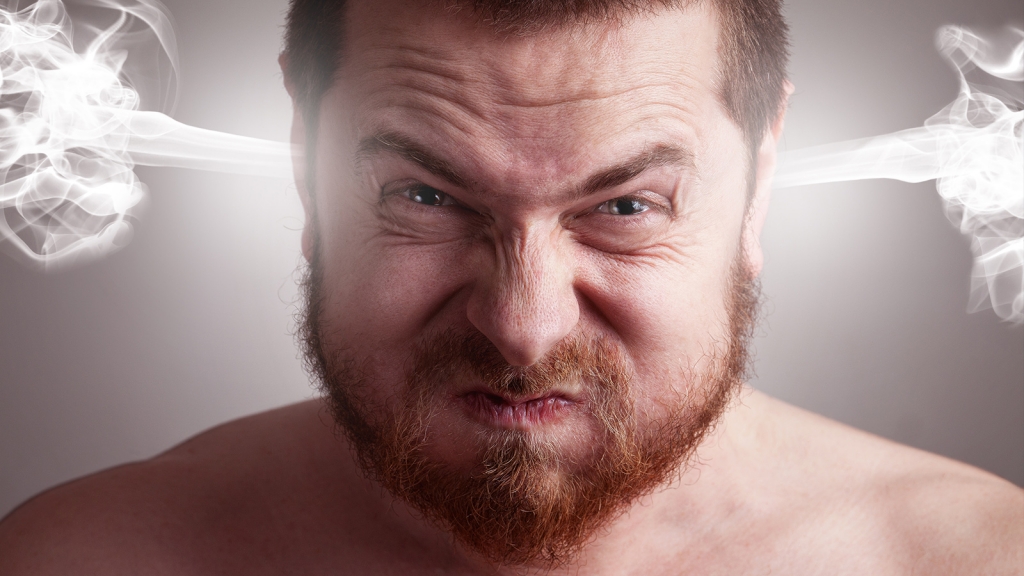 anger-management Adult attempting to manage anger with angry expression and steam coming out of ears.